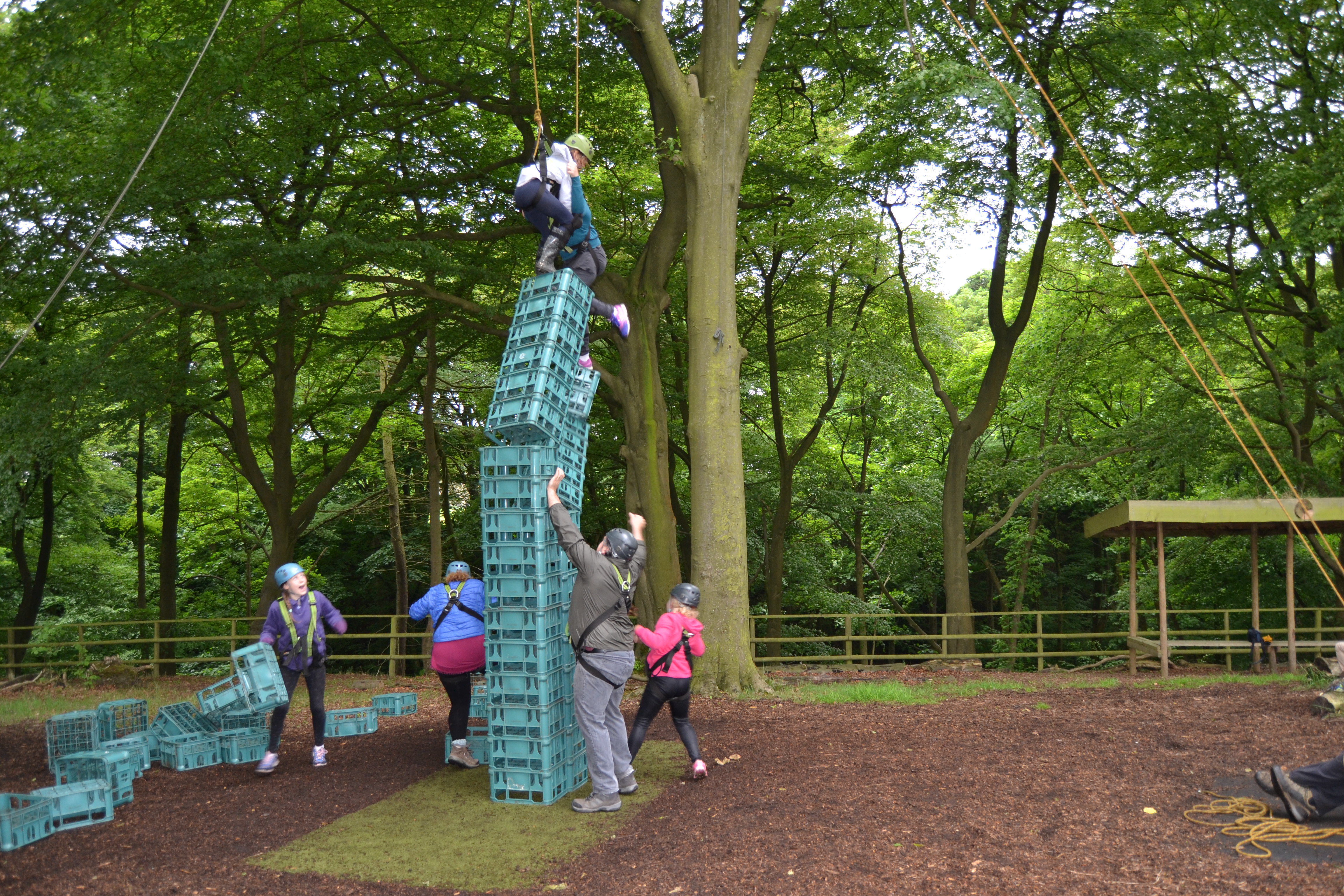 family group crate stacking at Outdoor Elements